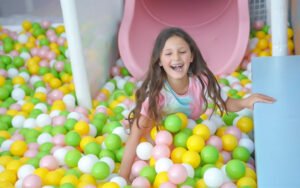 Real photo of indoor playground equipment with soft padded structure