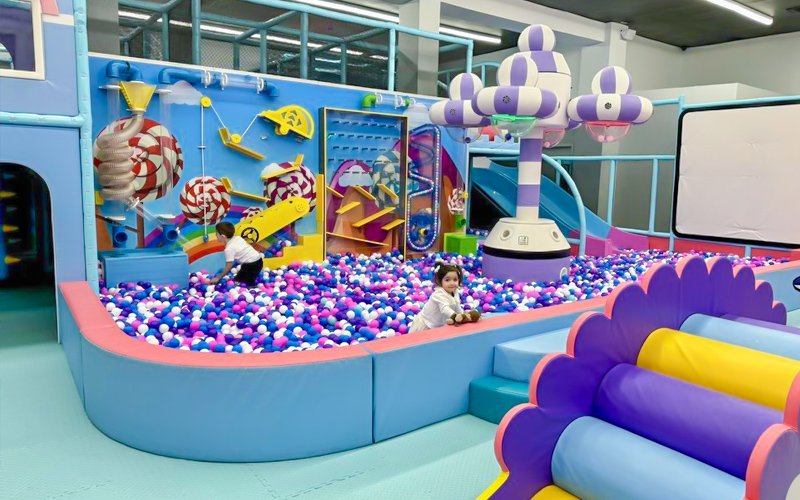 Colorful indoor playground environment built to attract paying customers